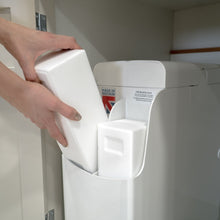 Load image into Gallery viewer, Loading salt blocks into the TwinTec S4 Water Softener