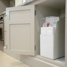 Load image into Gallery viewer, The TwinTec S4 Water Softener In a cupboard below the sink